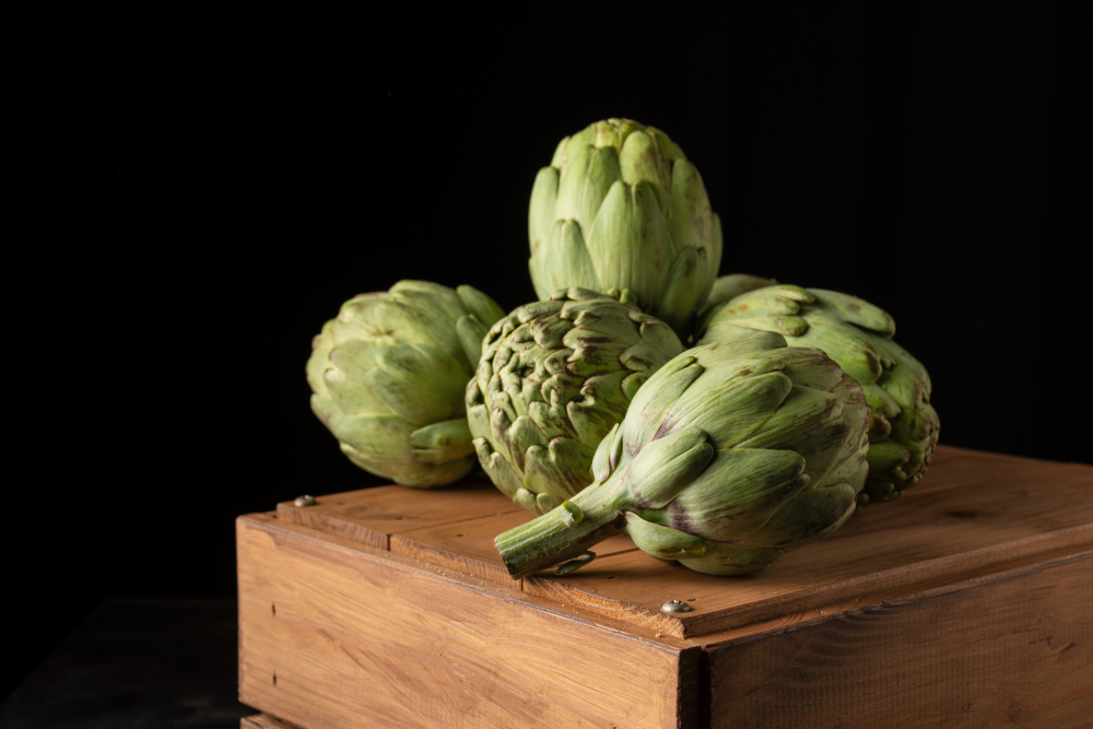 artichokes on wooden box