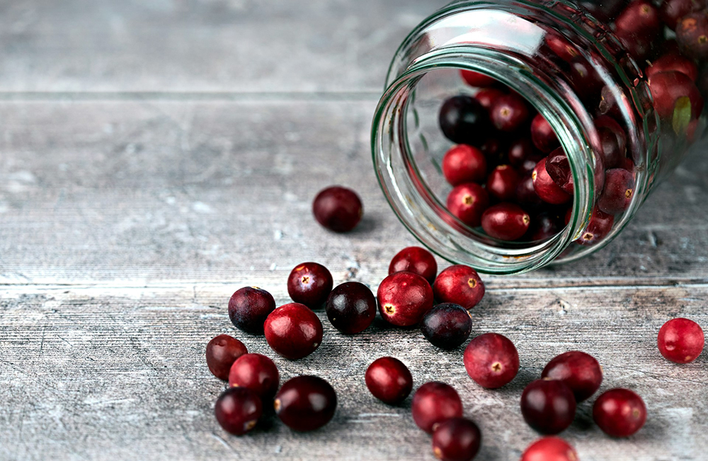 cranberries spilled from the jar